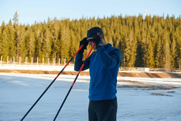Handsome Male Athlete Cross Country Skis Preparing Equipment Training Snowy — Zdjęcie stockowe