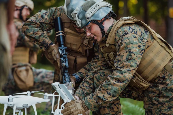 Modern Warfare Soldiers Squad are Using Drone for Scouting and Surveillance During Military Operation in the Forest.