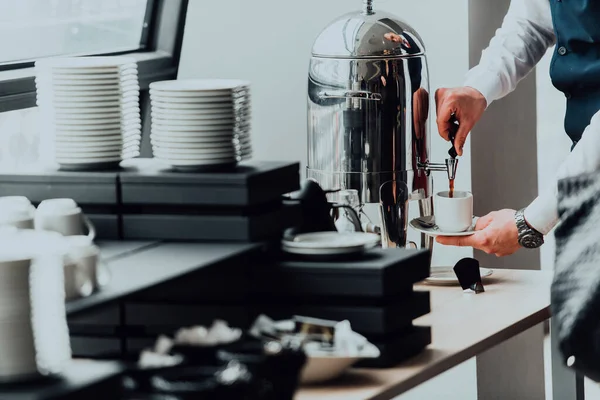 stock image The waiter preparing coffee for hotel guests. Close up photo of service in modern hotels. 