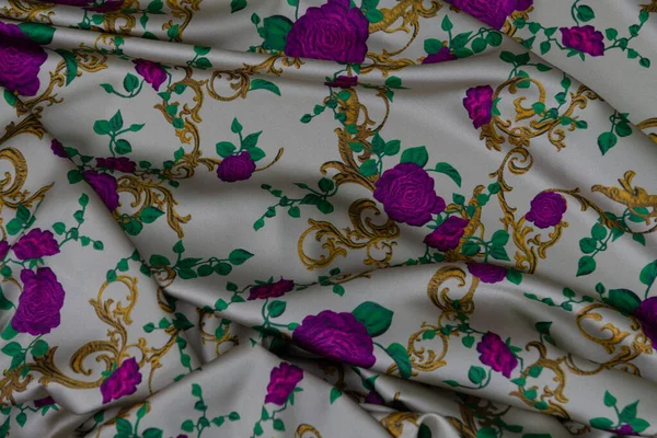 Collection of fashionable fabrics. Samples of different natural fabrics for sewing a fashion collection of clothes. Large selection of fabrics in the store or tailor warehouse. High quality photo