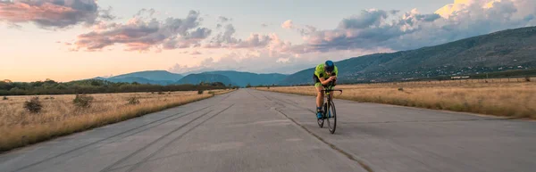Triathlete Riding His Bicycle Sunset Preparing Marathon Warm Colors Sky — Stock Photo, Image