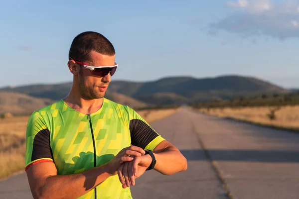 Triathlete Checking His Training Statistics Smartwatch Analyzing His Performance Progress — Stock Photo, Image