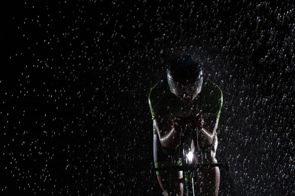 Triathlete Braving Rain Cycles Night Preparing Himself Upcoming Marathon Blurred — Stock Photo, Image