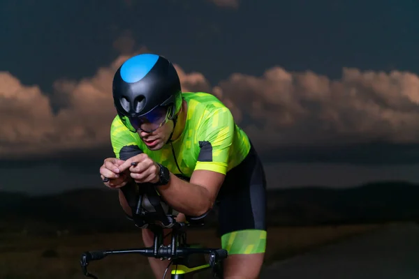 Triathlete Rides His Bike Darkness Night Pushing Himself Prepare Marathon — Stock Photo, Image