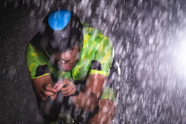 Triathlete Braving Rain Cycles Night Preparing Himself Upcoming Marathon Blurred — Stock Photo, Image
