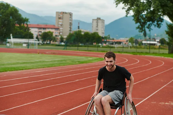 A person with disability in a wheelchair training tirelessly on the track in preparation for the Paralympic Games