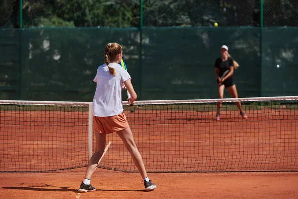 Young Girls Lively Tennis Match Sunny Day Demonstrating Skills Enthusiasm — Stock Photo, Image