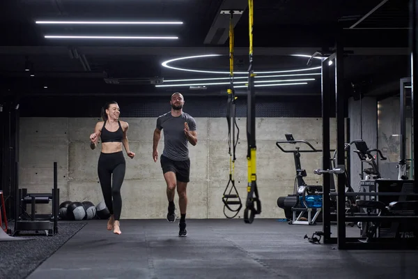 Fit Couple Modern Gym Engaging Running Exercises Showcasing Athletic Prowess — Stock Photo, Image