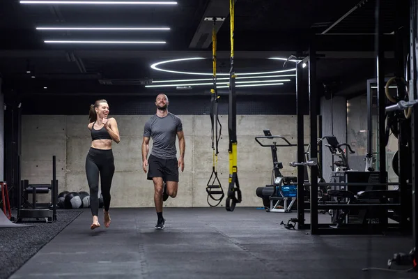 Fit Couple Modern Gym Engaging Running Exercises Showcasing Athletic Prowess — Stock Photo, Image
