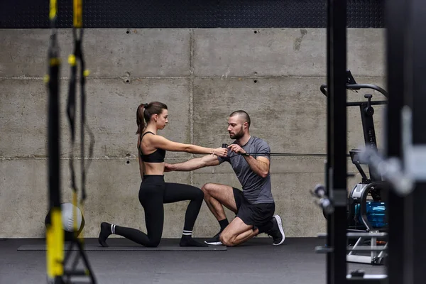 Muscular Man Assisting Fit Woman Modern Gym Engage Various Body — Stock Photo, Image