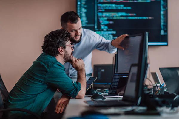 Programmers Engrossed Deep Collaboration Diligently Working Together Solve Complex Problems — Stock Photo, Image