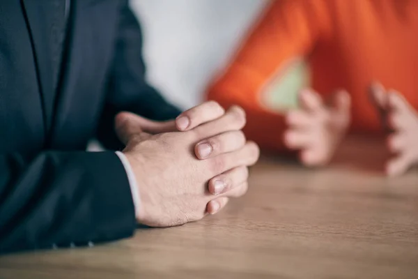 stock image Closeup photo, the hands of businessmen sitting at a business meeting can be seen as they discuss various business ideas and engage in productive collaboration