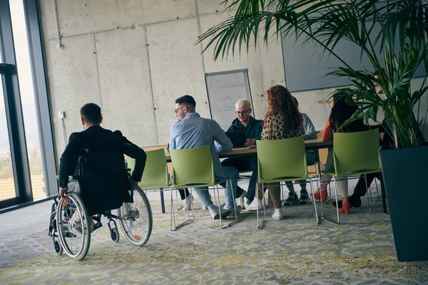 Diverse Group Business Professionals Including Person Disability Gathered Modern Office — Stock Photo, Image