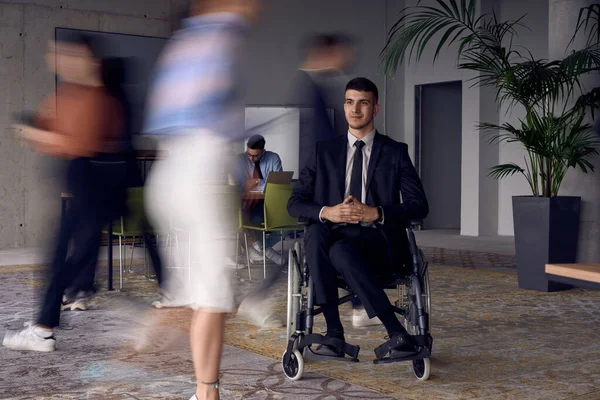 Businessman Wheelchair Modern Office Surrounded His Colleagues Who Portrayed Blurred — Stock Photo, Image