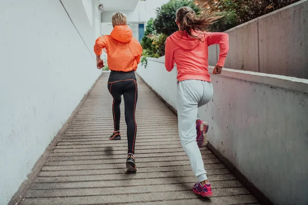 Two Women Sports Clothes Running Modern Urban Environment Concept Sporty — Stockfoto