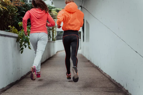 Two Women Sports Clothes Running Modern Urban Environment Concept Sporty — Stock fotografie