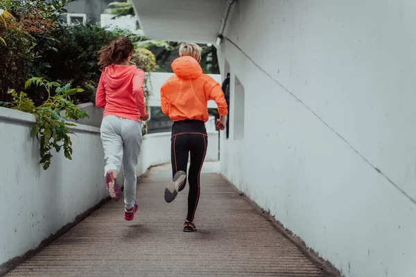 Two Women Sports Clothes Running Modern Urban Environment Concept Sporty — 图库照片