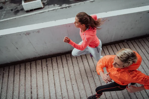 Two Women Sports Clothes Running Modern Urban Environment Concept Sporty — Fotografia de Stock