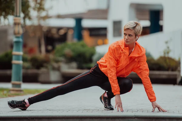 Fit Attractive Woman Sportswear Stretching One Leg Jogging Footpath Outdoor — Foto de Stock