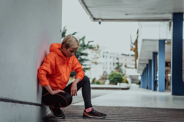 stock image Young smiling female resting after an active fitness training . 