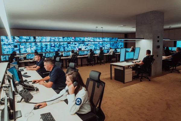 Group Security Data Center Operators Working Cctv Monitoring Room Looking — Fotografia de Stock