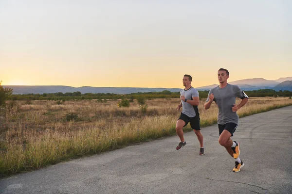 Group Handsome Men Running Together Early Morning Glow Sunrise Embodying — Stock Photo, Image