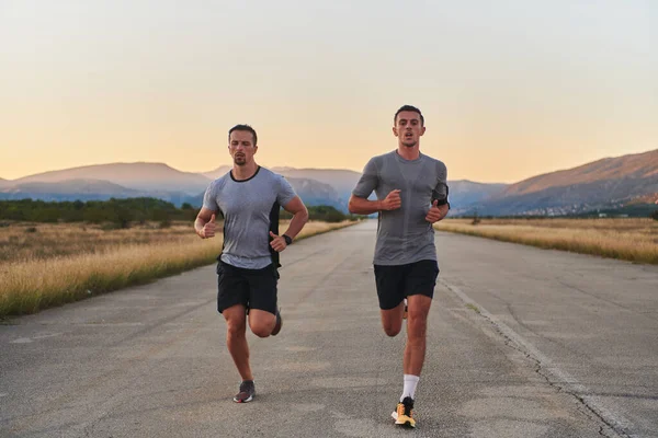 Group Handsome Men Running Together Early Morning Glow Sunrise Embodying — Stock Photo, Image