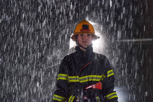 Determined Female Firefighter Professional Uniform Striding Dangerous Rainy Night Daring — Stock Photo, Image