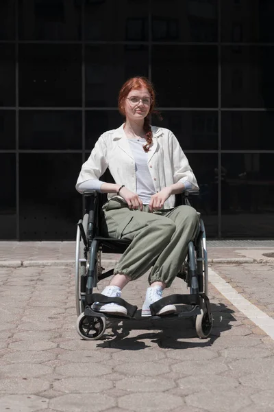 Front Modern Corporate Building Young Woman Sitting Wheelchair Confidently Symbolizing — Stock Photo, Image