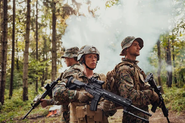 Modern Warfare Soldiers Squad Running in Tactical Battle Formation Woman as a Team Leader.