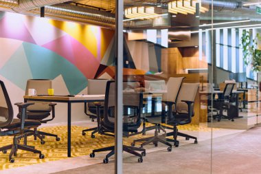 In the contemporary setting of an empty modern glass startup office, the space exudes a sleek and innovative atmosphere, ready to be filled with the potential of entrepreneurial endeavors.  clipart