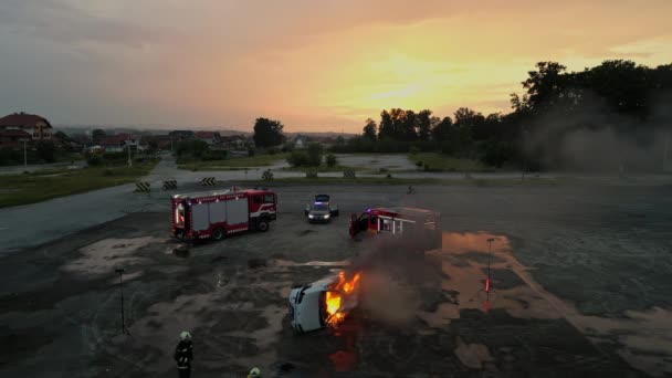 Aerial Drone Footage Group Professional Firefighters Working Together Extinguish Car — Stock Video
