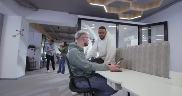 Diverse Group Colleagues Collaboratively Efficiently Tackles Various Business Tasks Modern — Stock Video