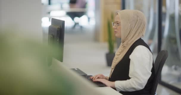 Modern Office Muslim Entrepreneur Wearing Hijab Sits Confidently Diligently Works — Stock Video