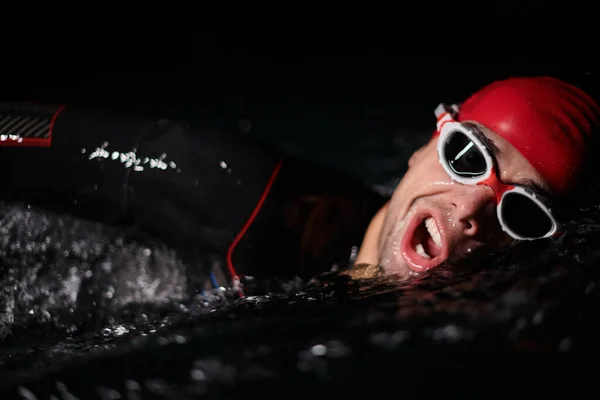 Determined Professional Triathlete Undergoes Rigorous Night Time Training Cold Waters — Stock Photo, Image