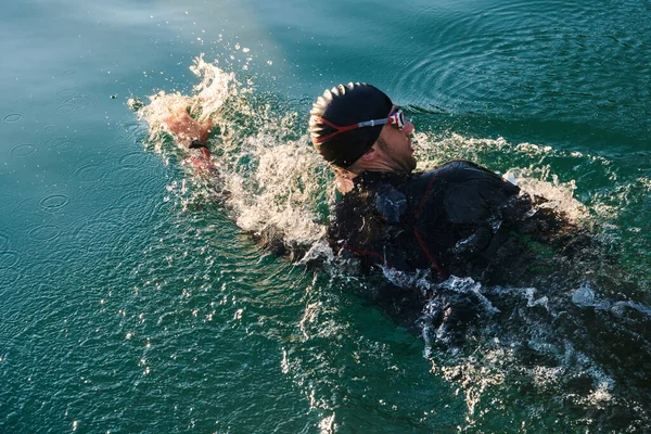 Triathlon Athlete Swimming Lake Sunrise Wearing Wetsuit High Quality Photo — Stock Photo, Image