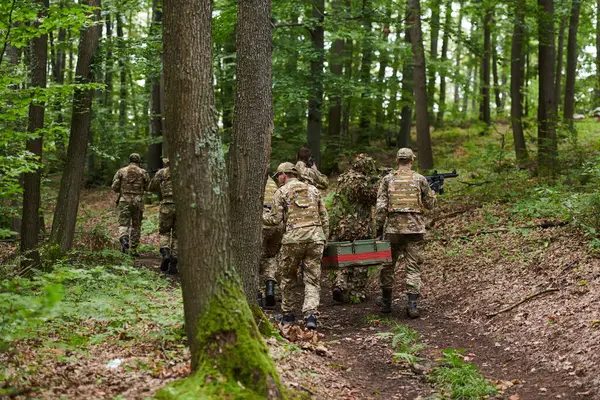 Elite Military Unit Cloaked Camouflage Transports Crate Ammunition Dense Forest — Stock Photo, Image