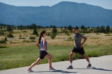 Exercise, mockup and couple workout and stretch together outdoors in nature by a mountain for health, wellness and fitness. People, partners and athletes training and keeping fit and heathy.  clipart