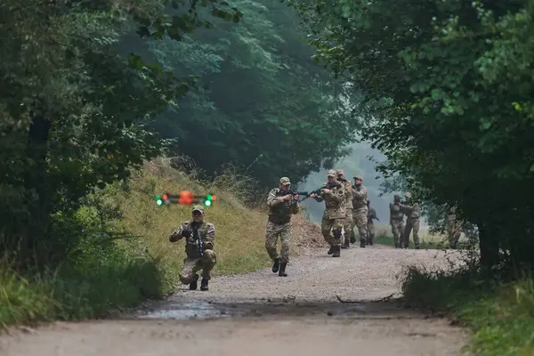 Elite Military Unit Parading Securing Forest Utilizing Drones Terrain Scanning — Stock Photo, Image
