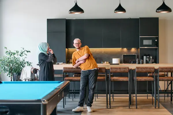 Candid Moment Captured Workplace Blonde Man Engages Conversation His Hijab Royalty Free Stock Photos