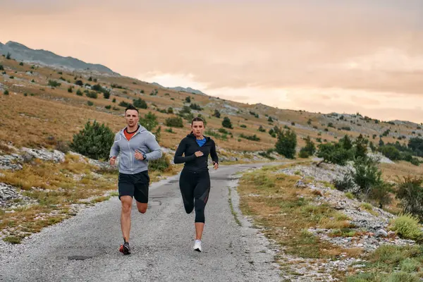 Couple Conquer Challenging Mountain Trails Invigorating Morning Run Ліцензійні Стокові Зображення