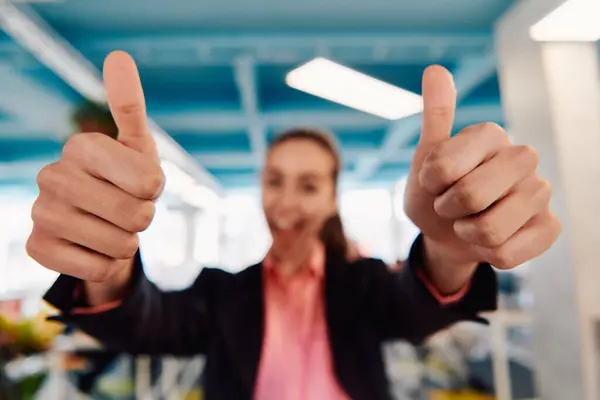 stock image Closeup of hands, Smiling Business Woman Making Frame Gesture with at modern bright coworking open space startup office. 