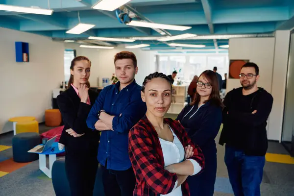 stock image Portrait of a successful creative businessman and businesswoman looking at camera and smiling. Diverse business people standing together at startup