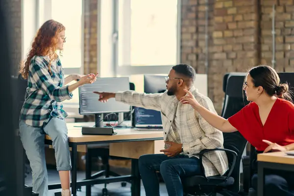 stock image A diverse group of young business individuals congregates in a modern startup coworking center, embodying collaborative innovation and a dynamic atmosphere.