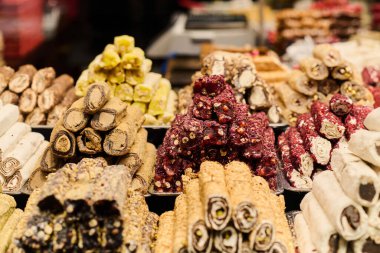 Immerse yourself in the vibrant tapestry of Istanbuls culinary scene as you feast your eyes on a tantalizing array of traditional Turkish sweets and pastries lining the bustling streets, inviting you clipart