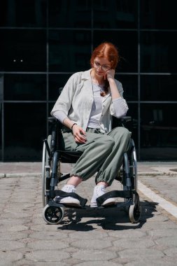 In front of a modern corporate building, a young woman sitting in a wheelchair confidently, symbolizing empowerment, inclusivity, and the strength to overcome challenges in the business world. clipart