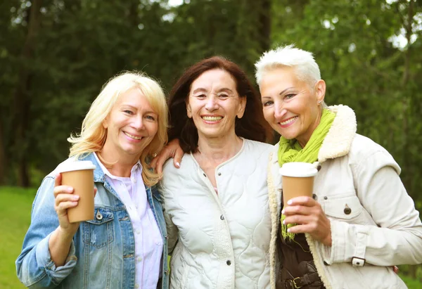 Charming Elderly Women Friends Walking Talking Drinking Coffee Summer Day — Foto de Stock