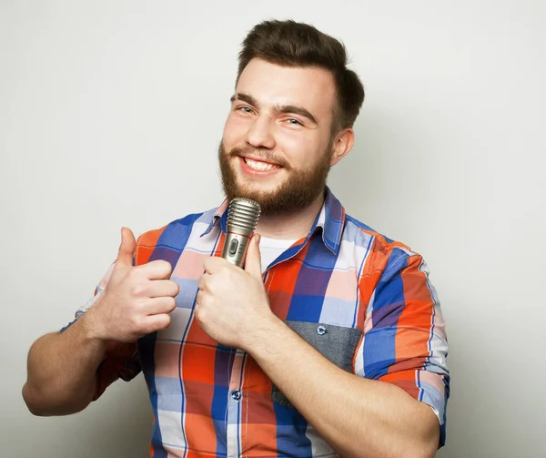 Lifestyle Concept Young Man Beard Wearing Plaid Shirt Holding Microphone — Stock Photo, Image