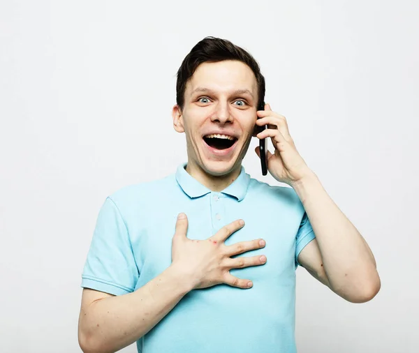 Happy Young Man Holding Phone His Ear Listening News Man — Stock Photo, Image