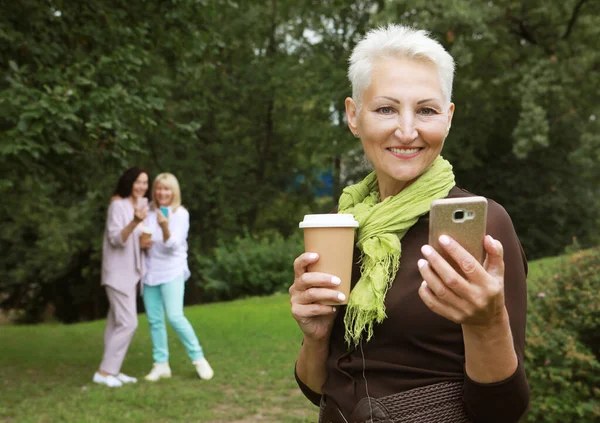 Beautiful Old Blond Woman Laughing Holding Cup Coffee Take Selfie — Foto de Stock